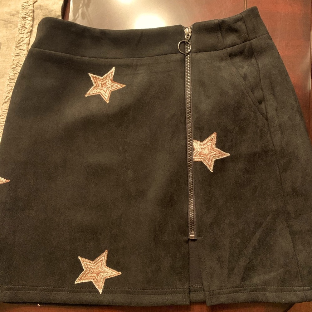 Faux black suede skirt with embroidery gold stars.